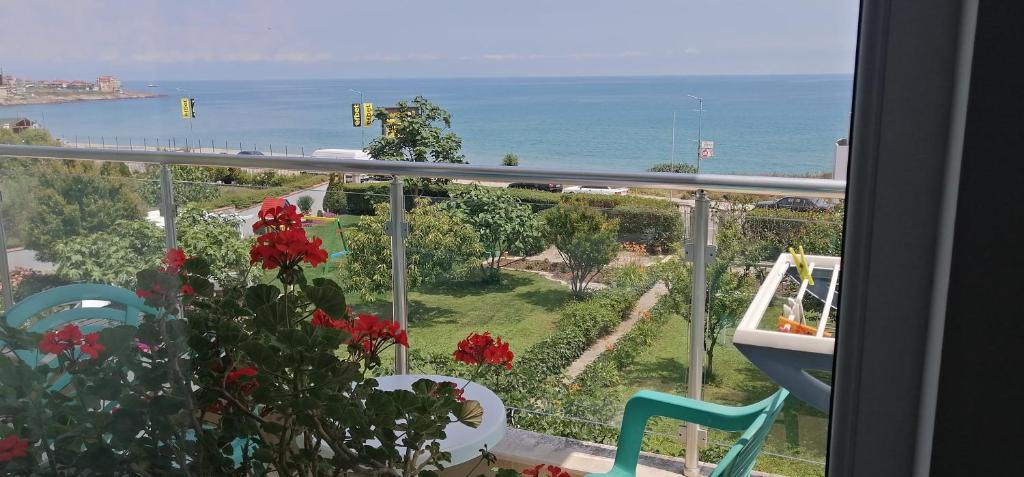 a view of the ocean from a balcony at Villa Flaga in Sozopol