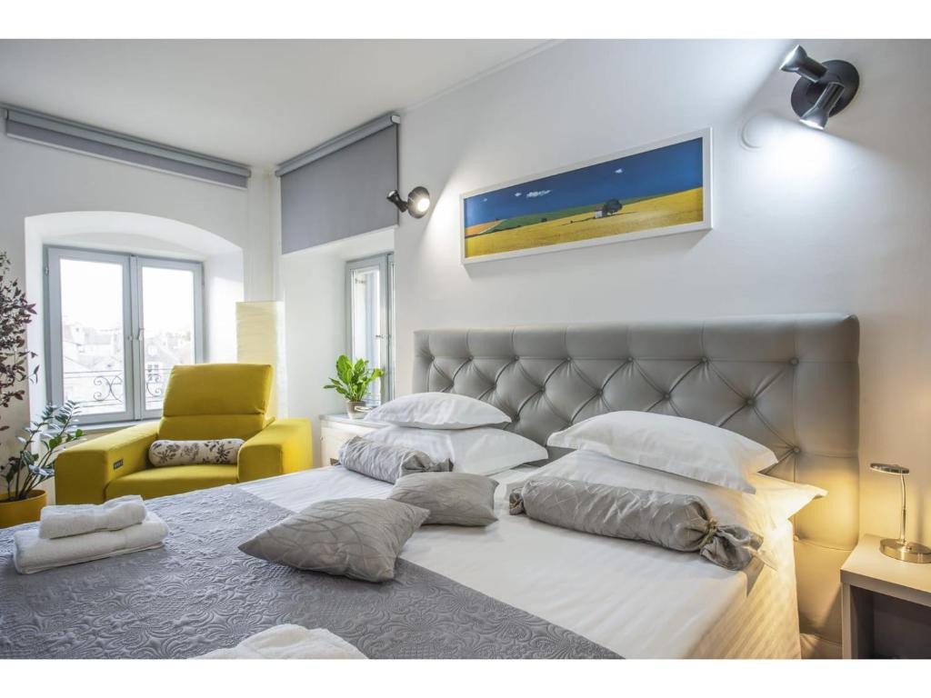 Posteľ alebo postele v izbe v ubytovaní Palace Tower View