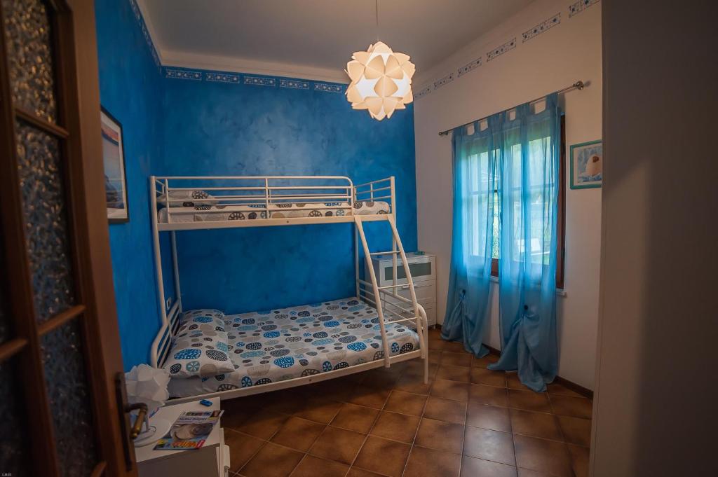 A bed or beds in a room at Totohouse Da Marco piscina riscaldata