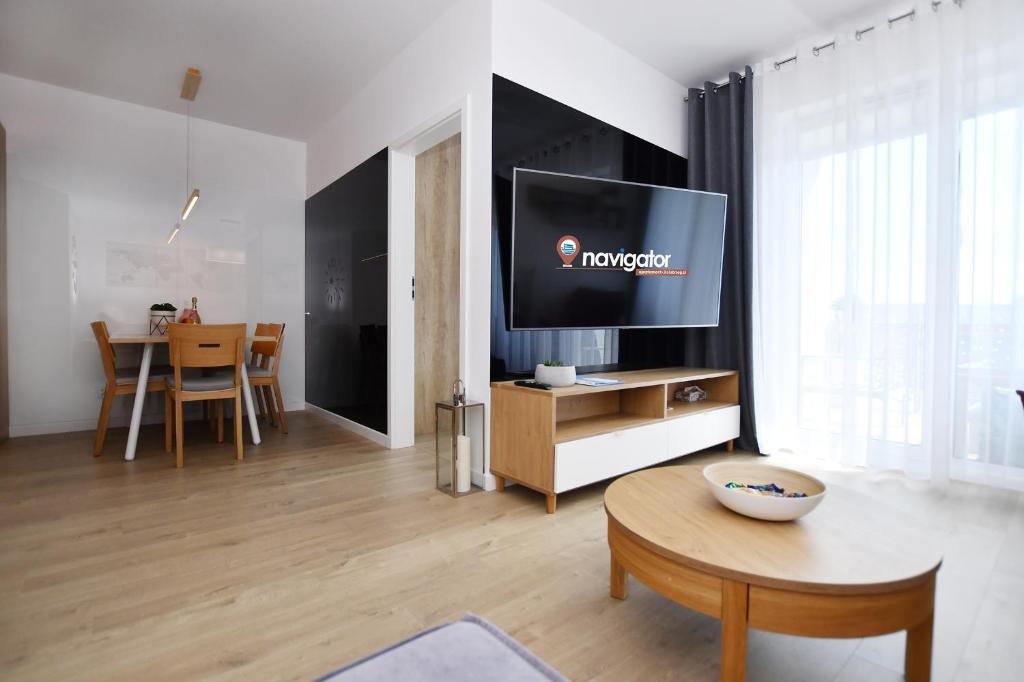 Televízia a/alebo spoločenská miestnosť v ubytovaní Apartamenty NAVIGATOR PORT-NADMORSKIE TARASY Brilliant 613