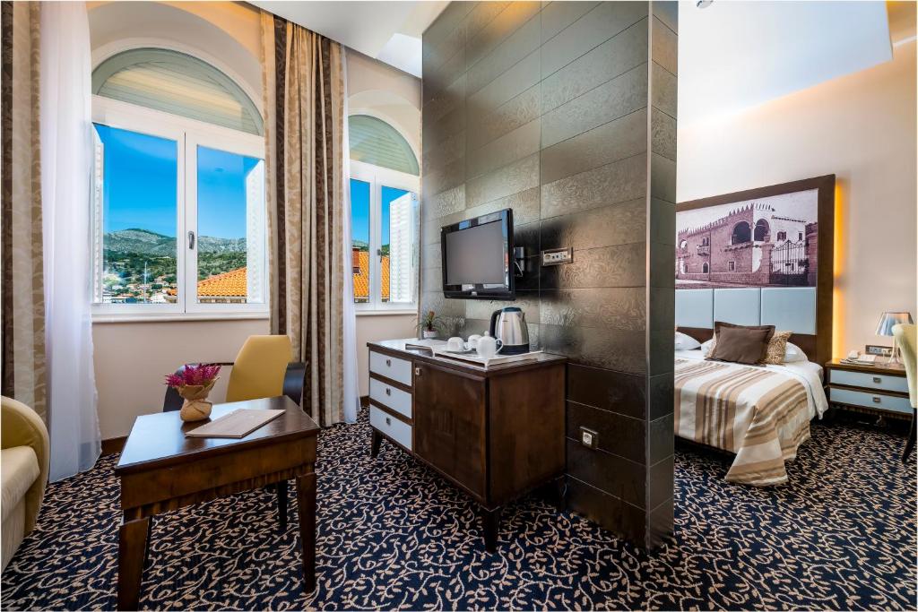 TV a/nebo společenská místnost v ubytování Hotel Lapad