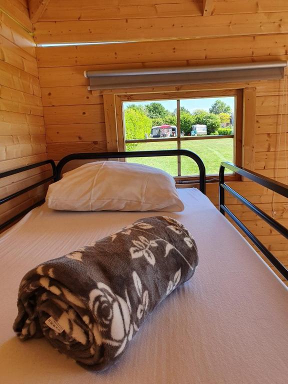 Postel nebo postele na pokoji v ubytování Camping de Oude Rijn