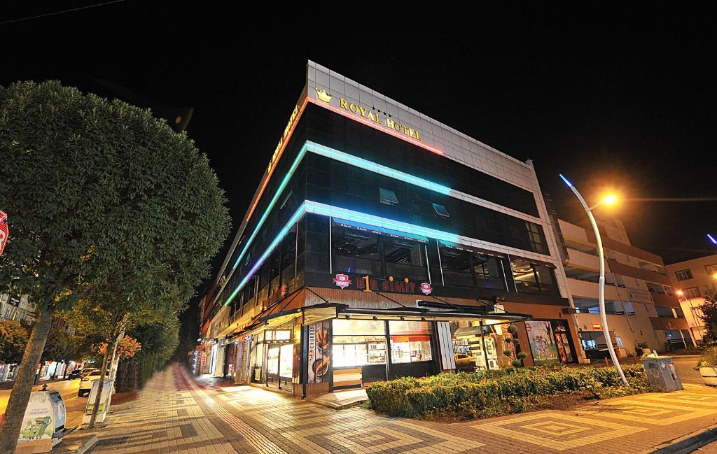 a building on a street at night at Royal Hotel Inegol in Inegol