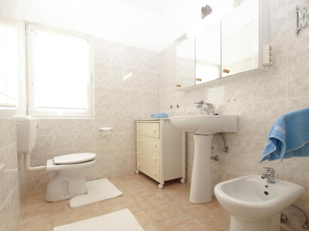 Koupelna v ubytování Apartments Biskupije 810