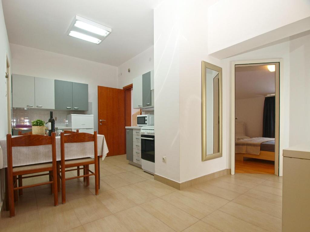 Kuchyň nebo kuchyňský kout v ubytování Apartments Biskupije 810