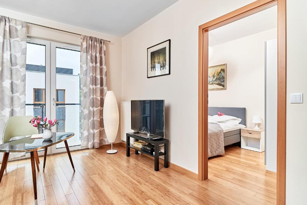 Posteľ alebo postele v izbe v ubytovaní Exclusive Apartments Marina by Noclegi Renters