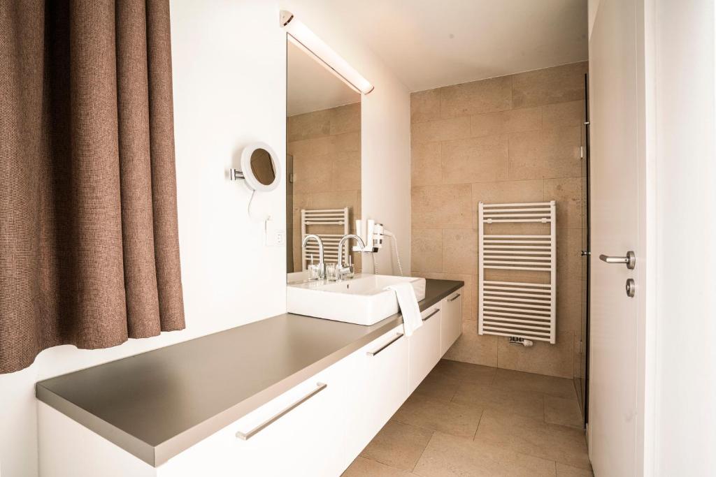 A bathroom at Tauernresidence Radstadt by ALPS RESORTS