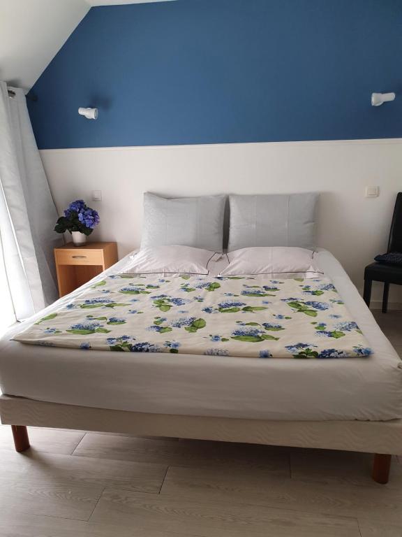 Postel nebo postele na pokoji v ubytování Hôtel - Restaurant l'Hortensia