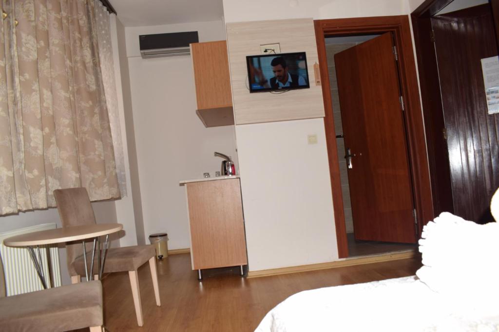 TV a/nebo společenská místnost v ubytování Royal Suites Besiktas