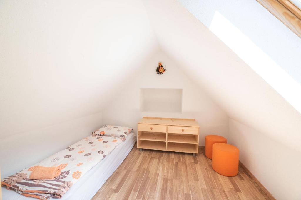 Postel nebo postele na pokoji v ubytování House DorMica