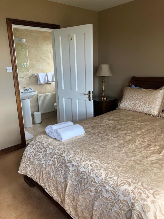 Postel nebo postele na pokoji v ubytování Seashore B&B