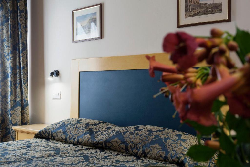 Postel nebo postele na pokoji v ubytování Zaguri B&B