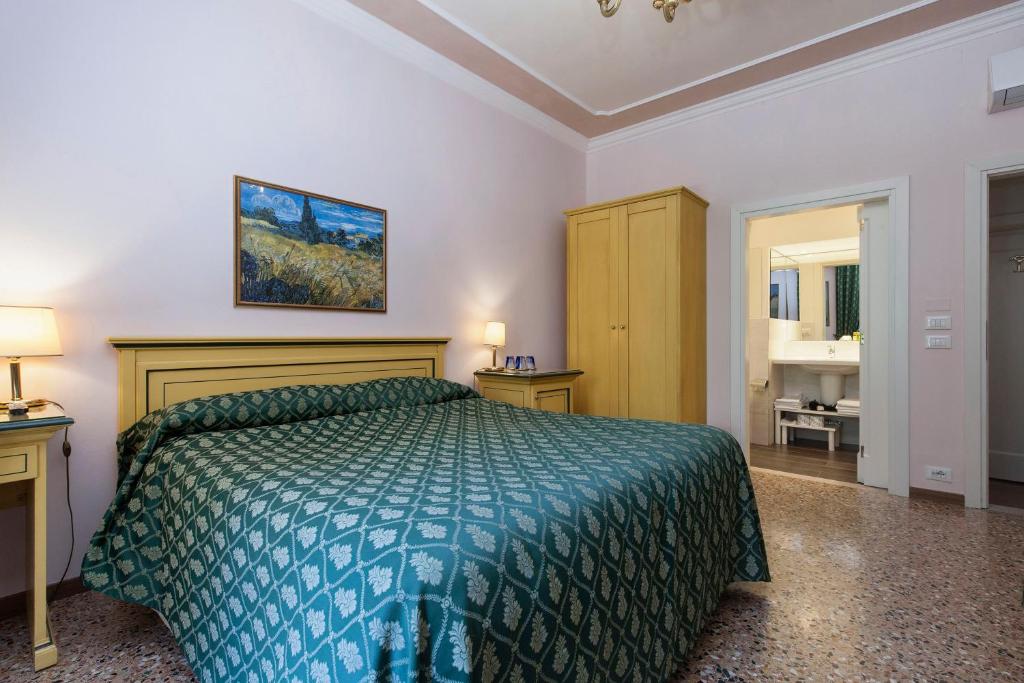 Postel nebo postele na pokoji v ubytování Zaguri B&B