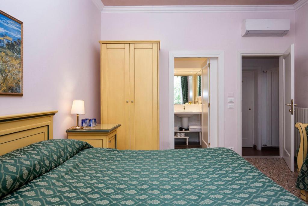 Postel nebo postele na pokoji v ubytování Zaguri B&B