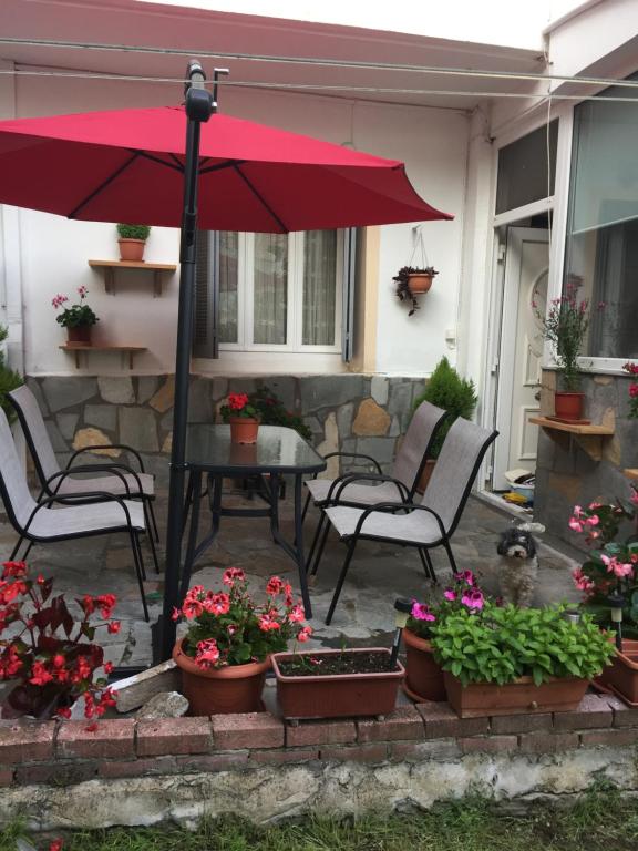 Patio nebo venkovní prostory v ubytování Sofis Garden