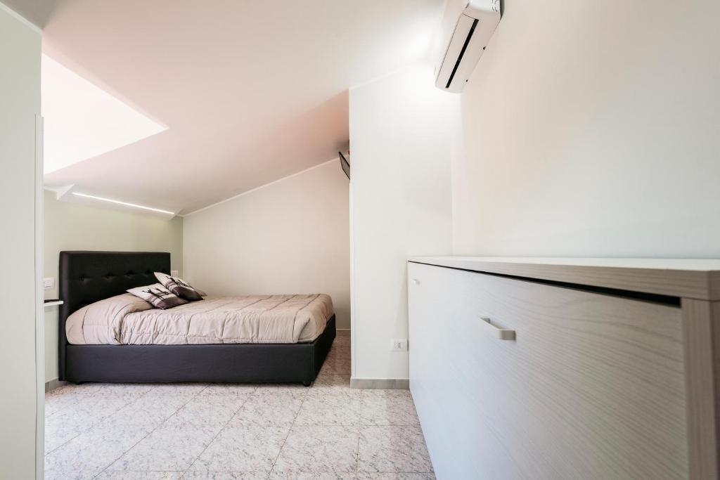 Postel nebo postele na pokoji v ubytování B&B Silver Sleep