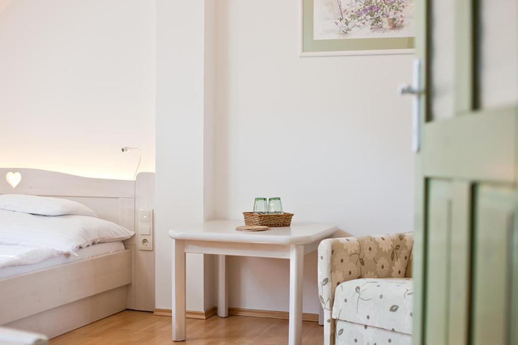 Posteľ alebo postele v izbe v ubytovaní Tornácos Hotel - Hegykő