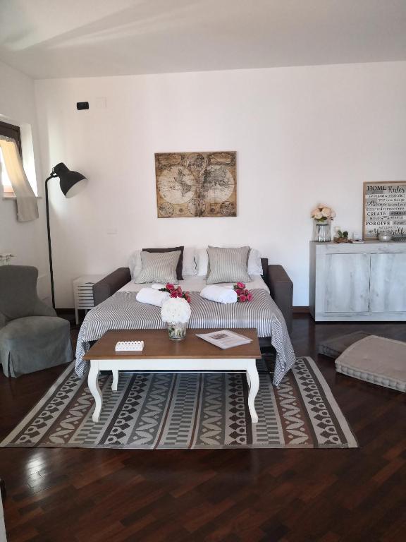 Łóżko lub łóżka w pokoju w obiekcie Perugino Apartments