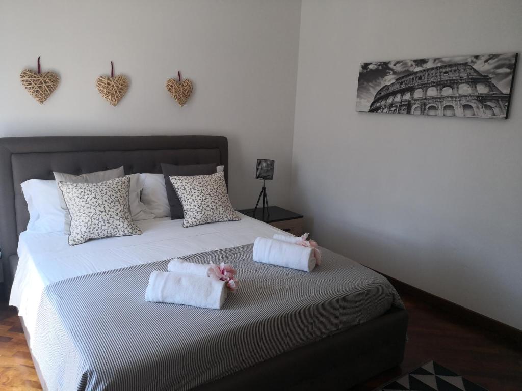 Łóżko lub łóżka w pokoju w obiekcie Perugino Apartments