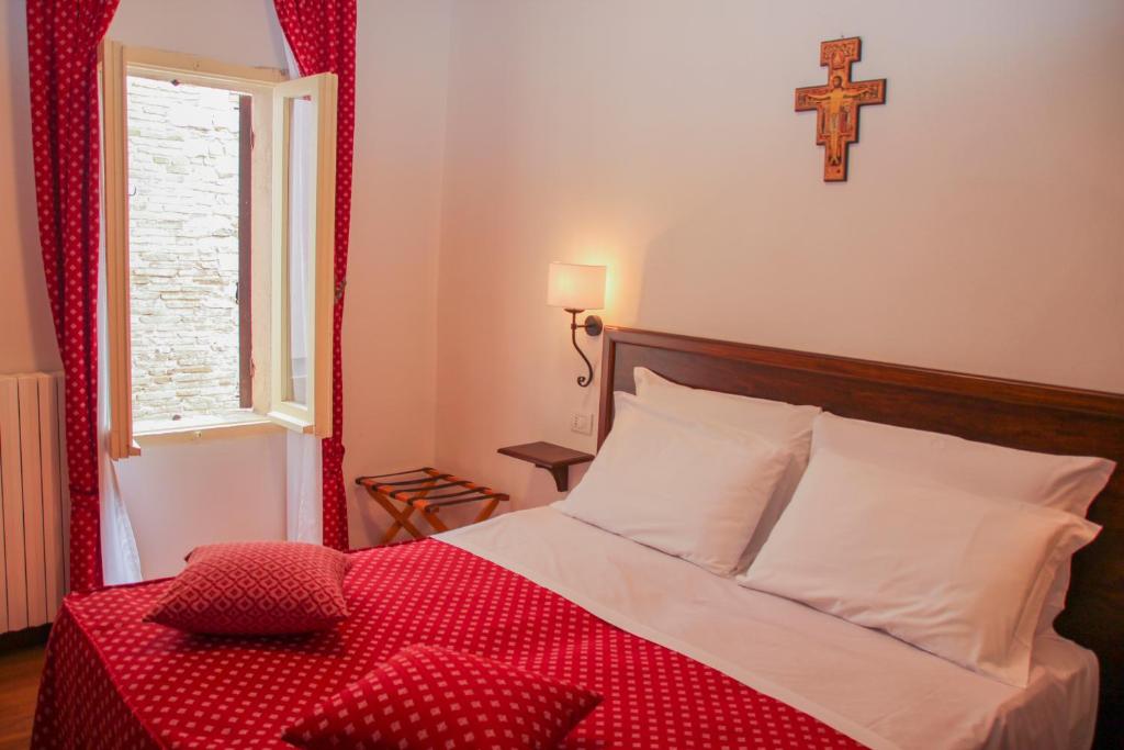 Postel nebo postele na pokoji v ubytování Hotel Pax