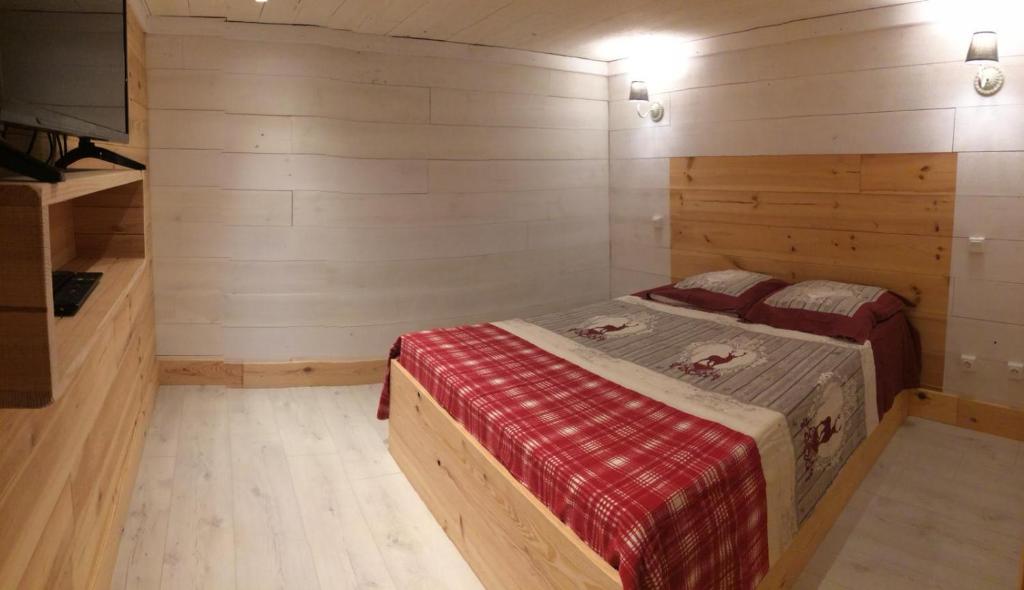 Postel nebo postele na pokoji v ubytování L'Isba