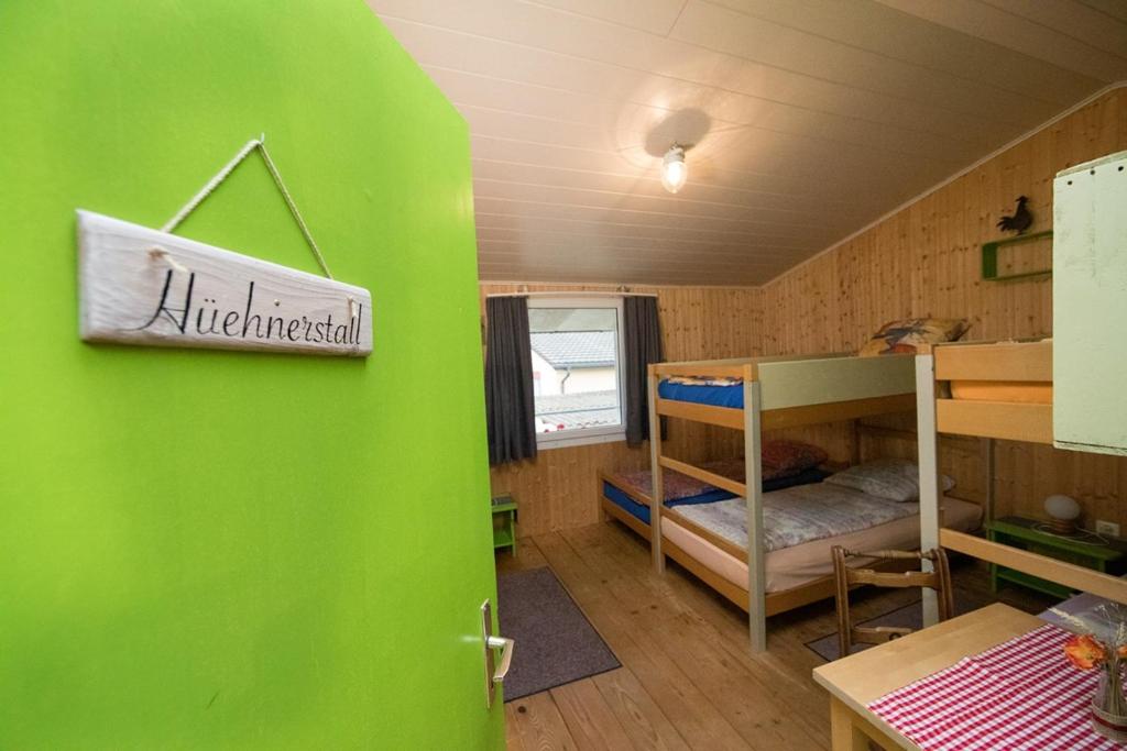 Postel nebo postele na pokoji v ubytování Hof-Tschannen