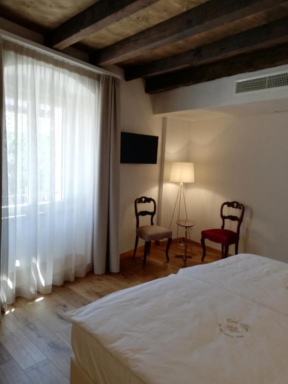 Postel nebo postele na pokoji v ubytování Corte Alma Spa and Luxury Home