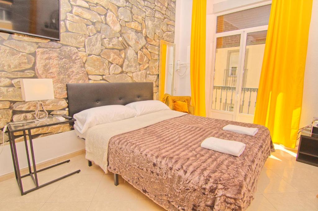 Postel nebo postele na pokoji v ubytování Balcony & Room Malaga centro