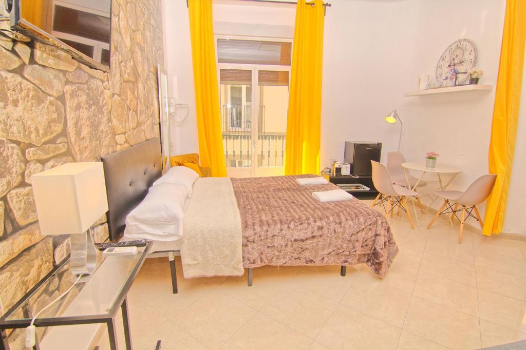 TV a/nebo společenská místnost v ubytování Balcony & Room Malaga centro