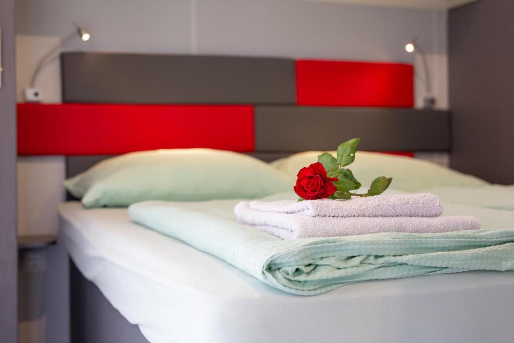 Posteľ alebo postele v izbe v ubytovaní Camping RAĆA