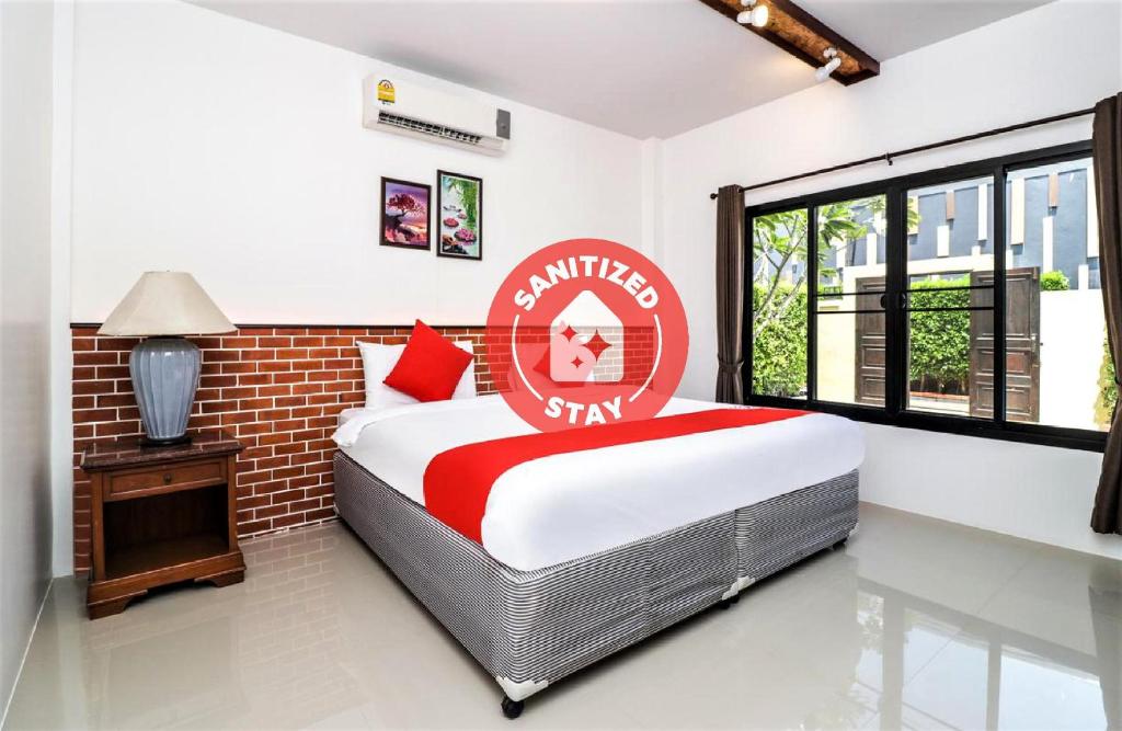 Postel nebo postele na pokoji v ubytování Baan Noppadol Hua Hin Loft