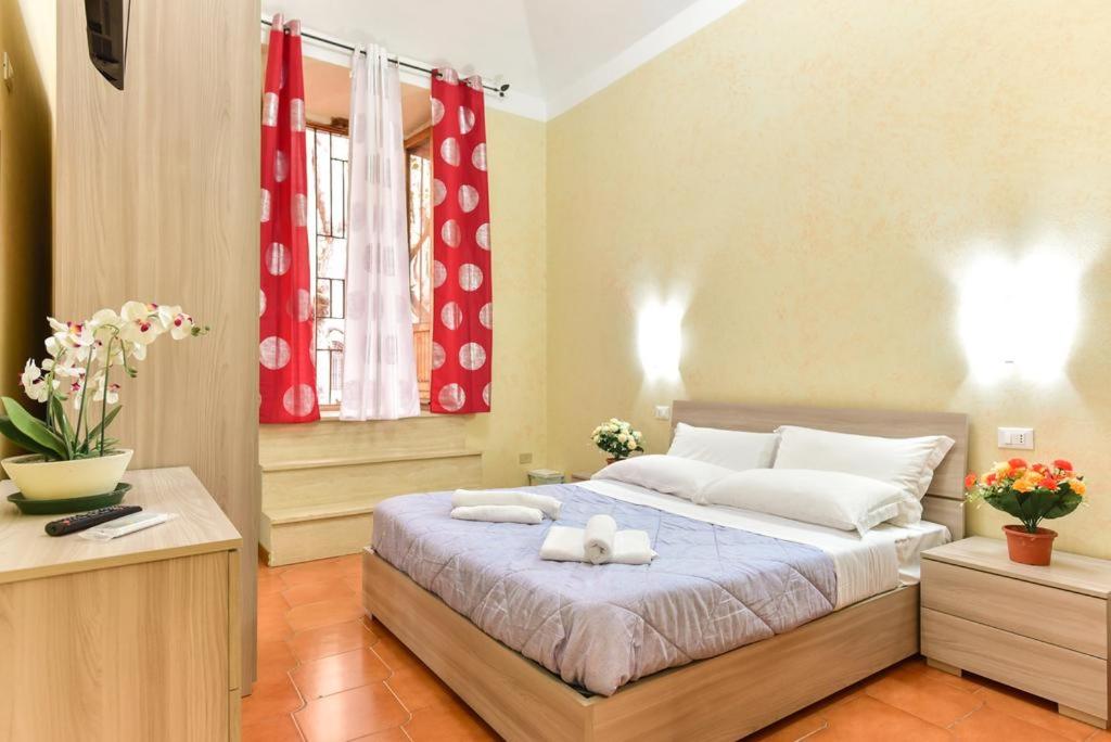 Posteľ alebo postele v izbe v ubytovaní B&B Termini