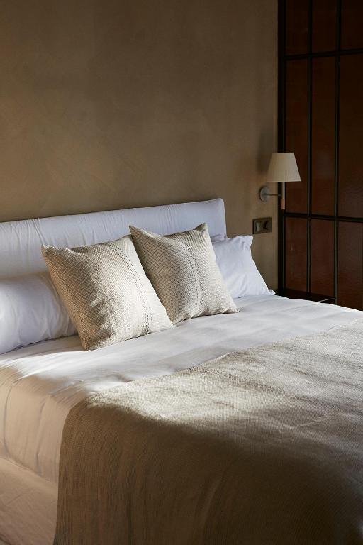 Postel nebo postele na pokoji v ubytování Boutique Hotel Mendi Argia