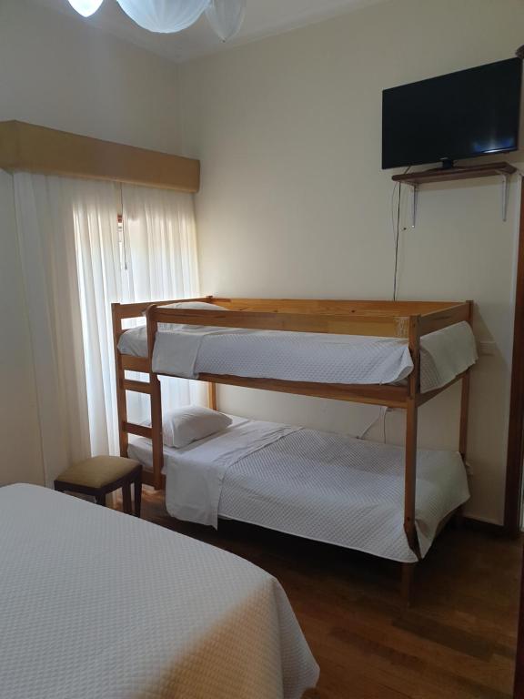 Postel nebo postele na pokoji v ubytování hostel do Ermal