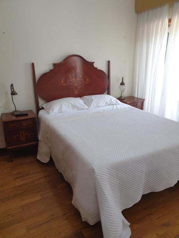 Postel nebo postele na pokoji v ubytování hostel do Ermal