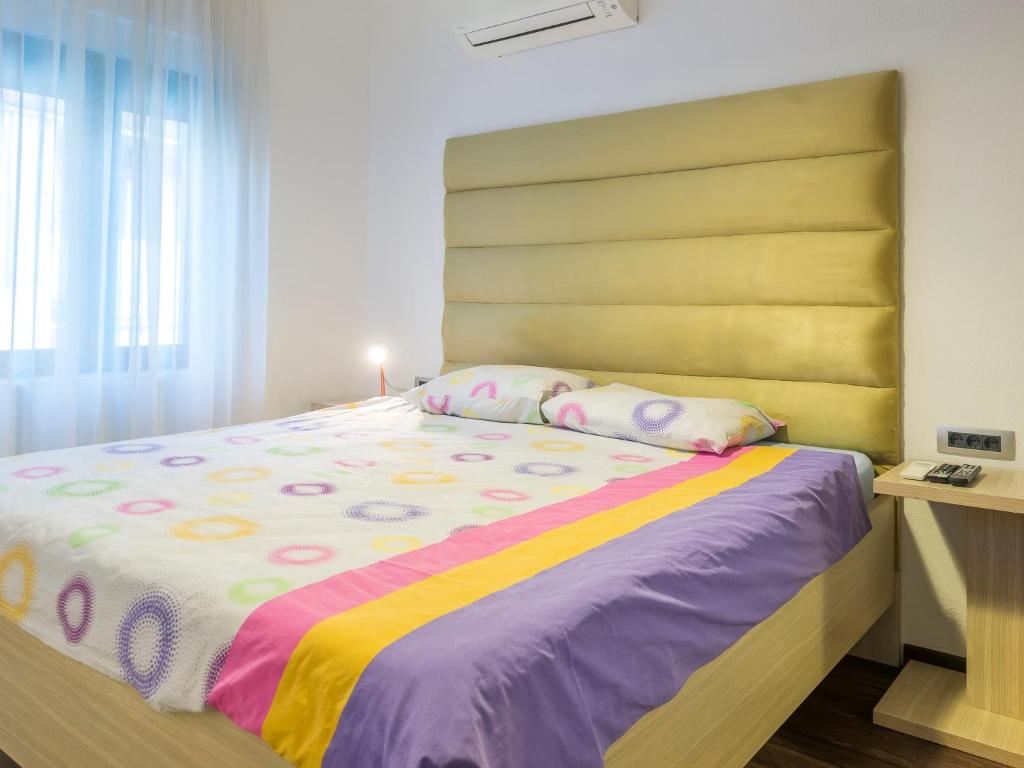 Postel nebo postele na pokoji v ubytování Apartments Windrose