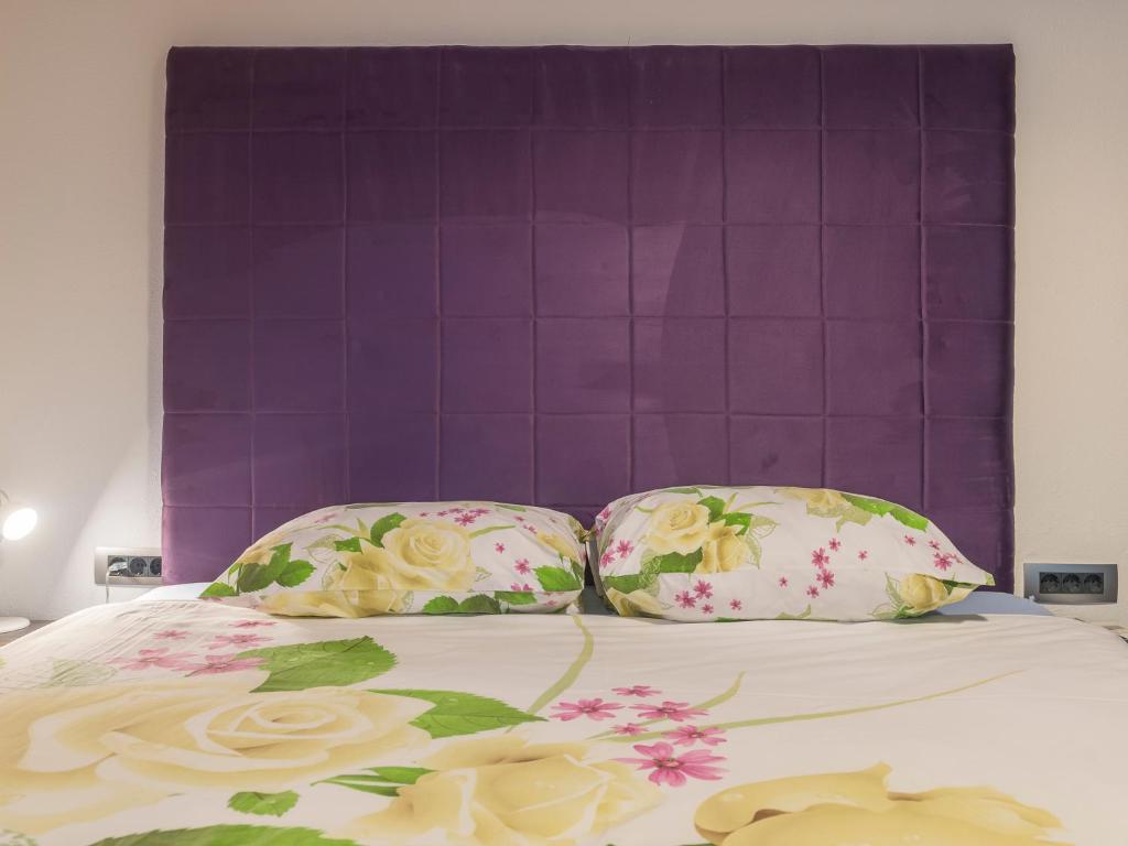 Postel nebo postele na pokoji v ubytování Apartments Windrose