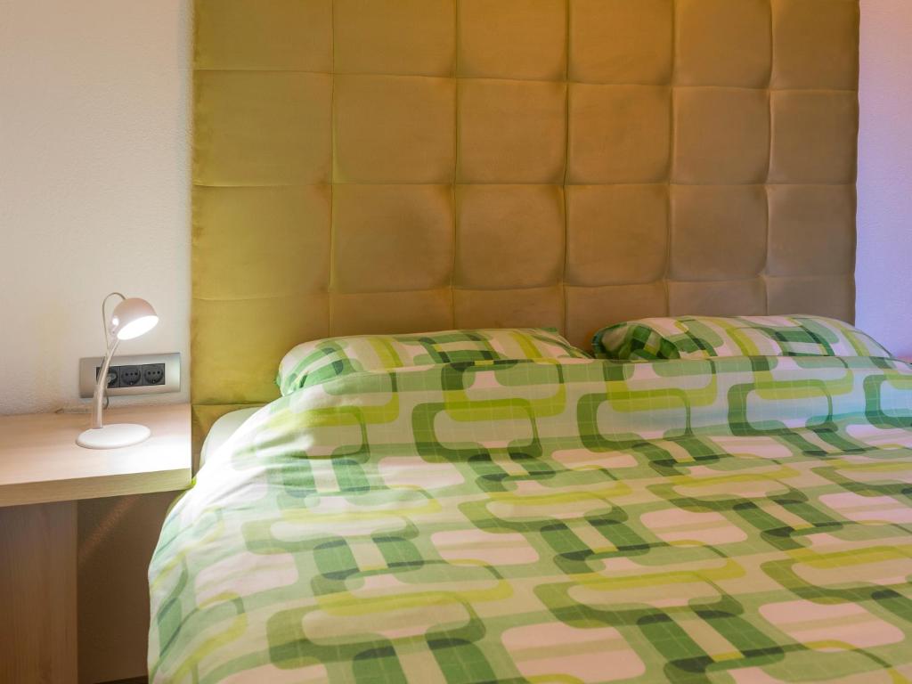 Postel nebo postele na pokoji v ubytování Apartments Windrose