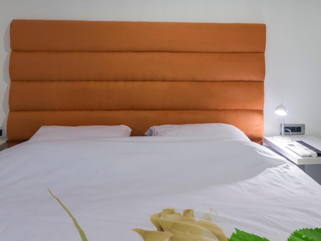 Postel nebo postele na pokoji v ubytování Apartments Windrose