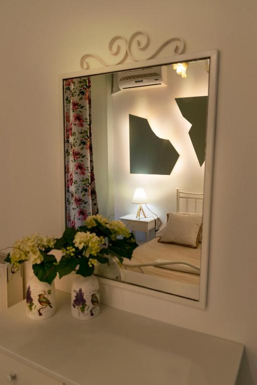 Łóżko lub łóżka w pokoju w obiekcie Family Inn Apartments&suites