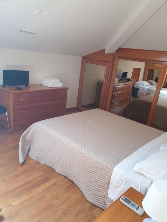 Postel nebo postele na pokoji v ubytování hostel do Ermal