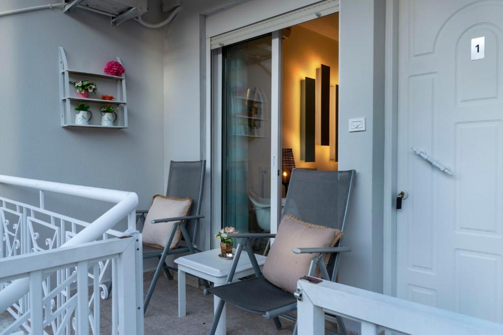 Balkon lub taras w obiekcie Family Inn Apartments&suites