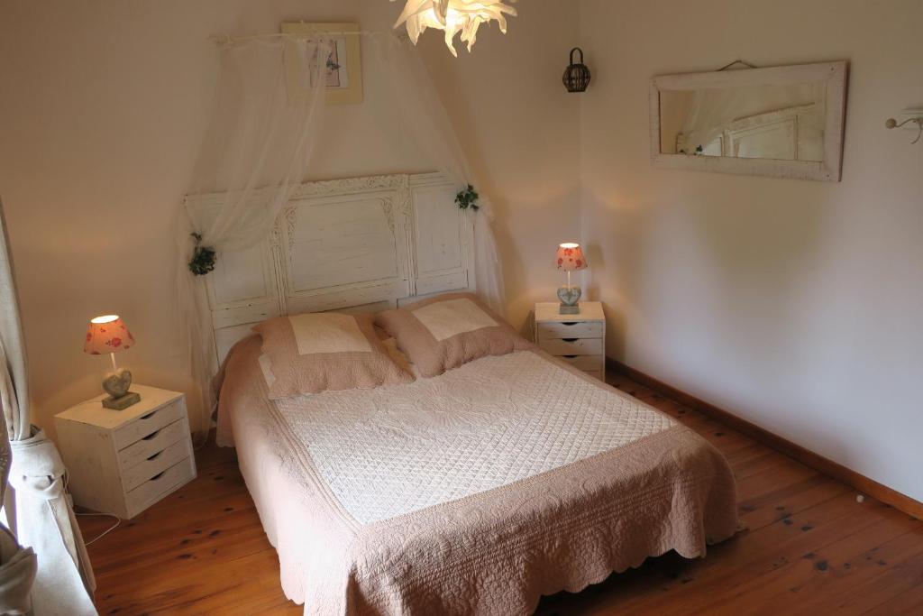 Postel nebo postele na pokoji v ubytování La Naomath - Maison d'hôtes, Hébergement insolite & Gîte