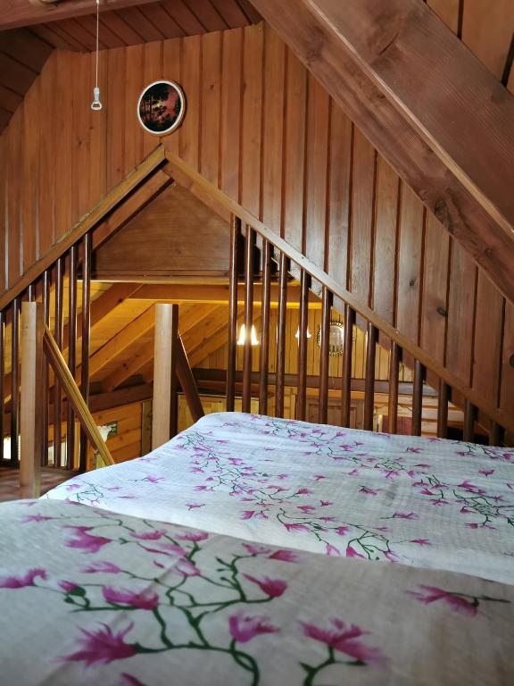 Posteľ alebo postele v izbe v ubytovaní Agroturystyka w ogrodach