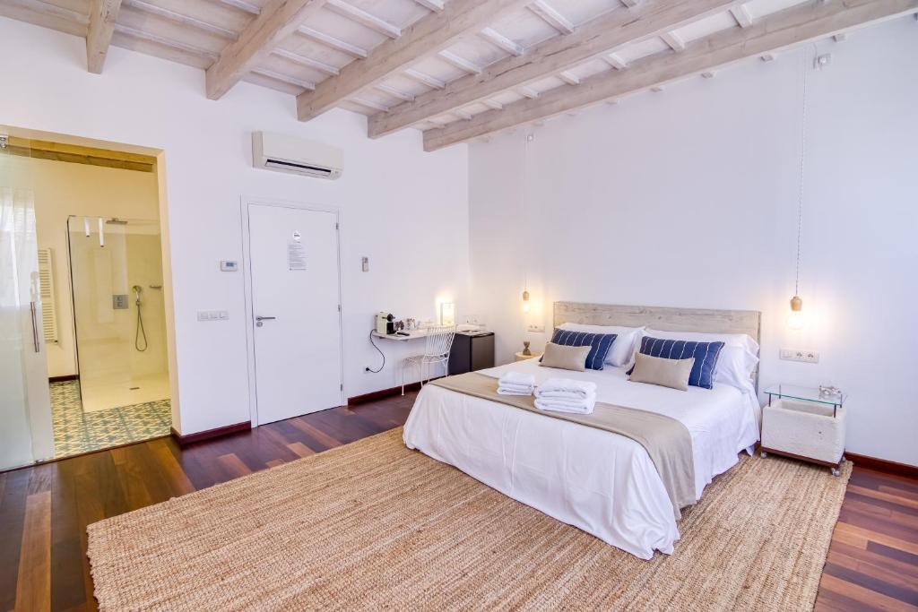 Postel nebo postele na pokoji v ubytování Hotel Ca S'Arader Turismo de Interior