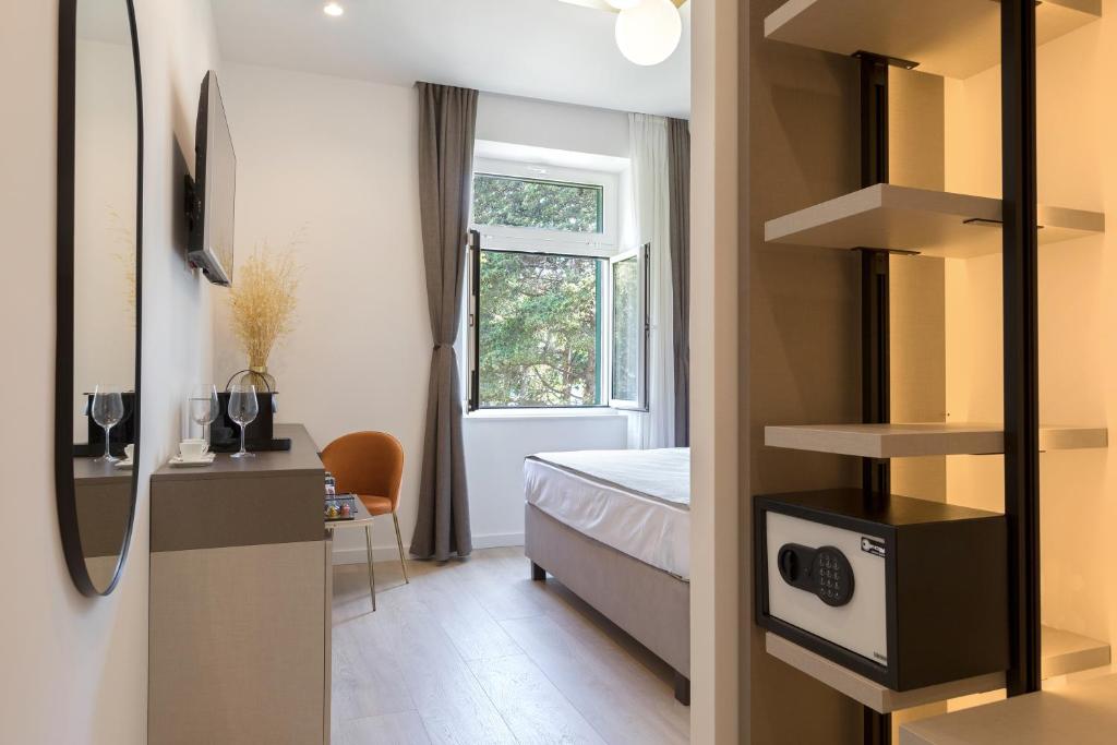 Postel nebo postele na pokoji v ubytování Green Park Luxury Rooms