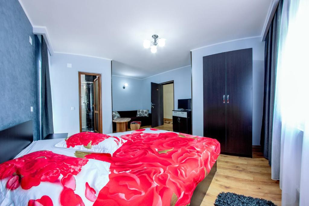 Postel nebo postele na pokoji v ubytování Vila Nico
