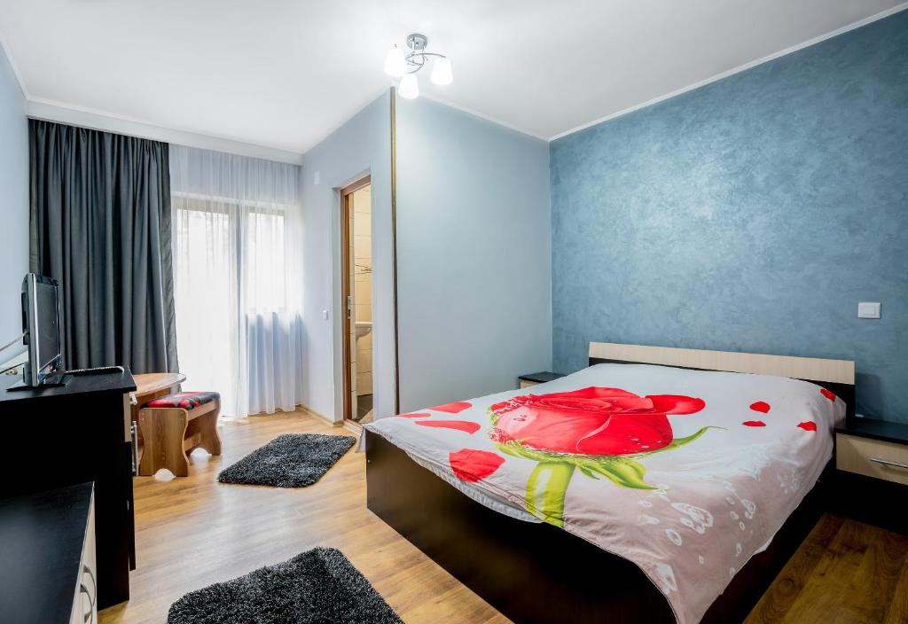 Postel nebo postele na pokoji v ubytování Vila Nico