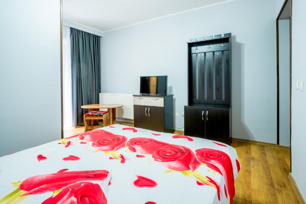 Postel nebo postele na pokoji v ubytování Vila Nico