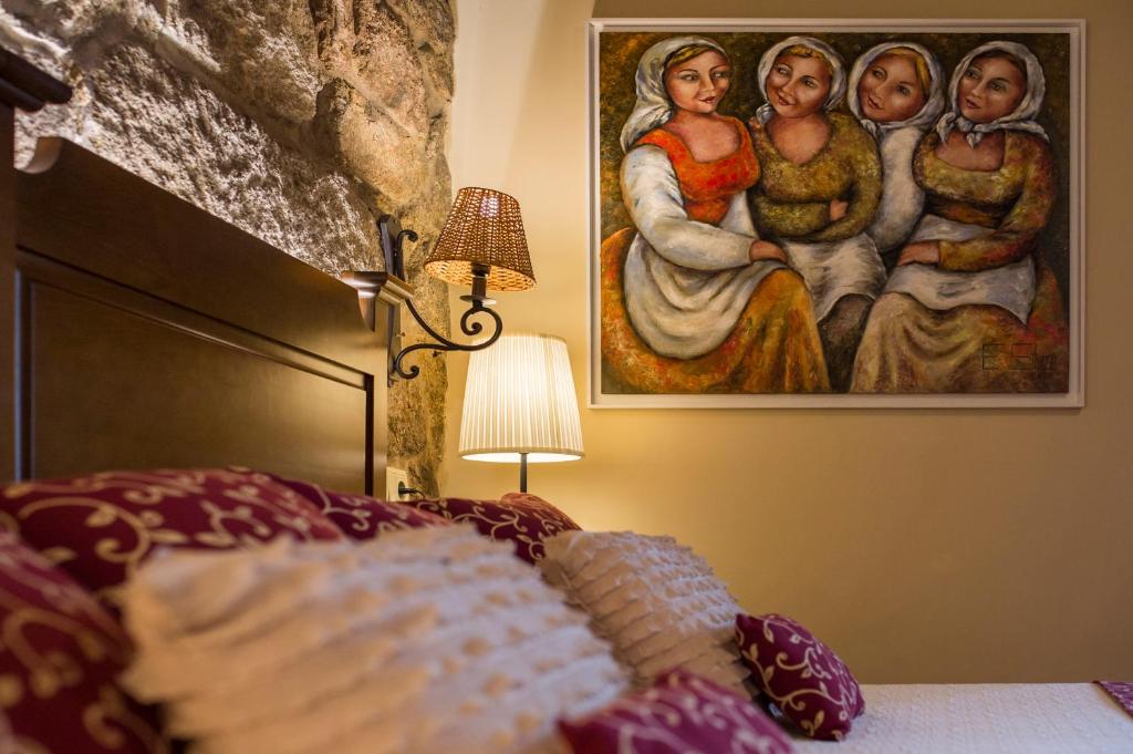 Postel nebo postele na pokoji v ubytování Casa da Muiñeira